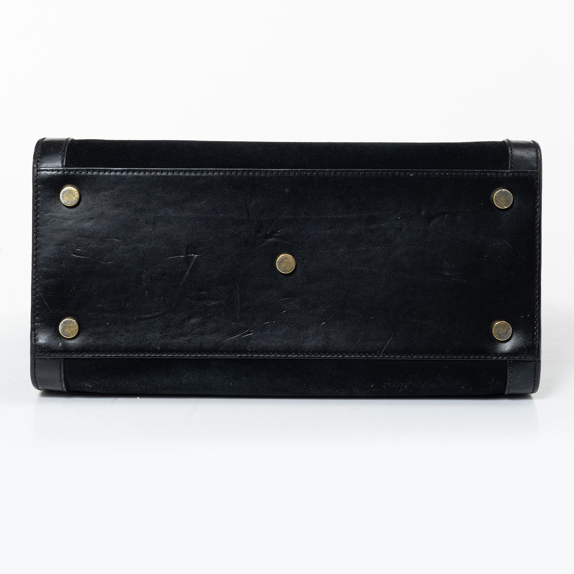 Yves Saint Laurent, a 'Sac du Jour' handbag.