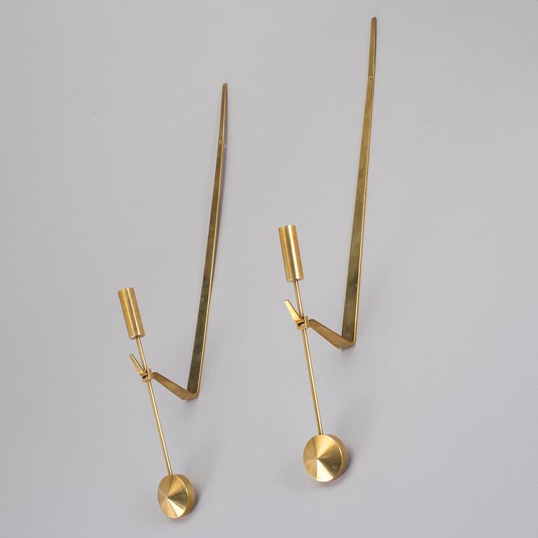 VÄGGLAMPETTER, 2 stycken, mässing, "Pendeln", Pierre Forsell, Skultuna, 1900-talets fjärde kvartal.