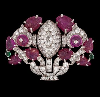 1168. A Cartier Art Deco ruby and diamond brooch, c. 1925-30.