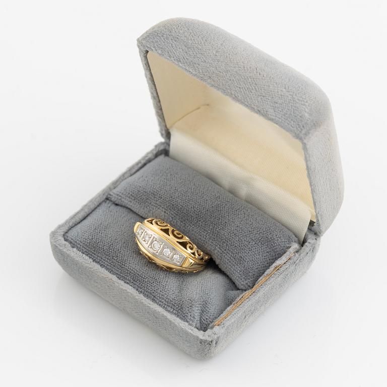 14K gold and brilliant cut diamond ring.