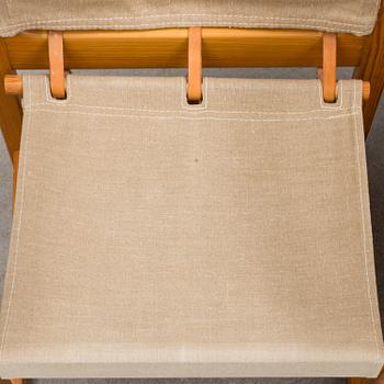 a set of three armchairs from the second half of the 20th century.