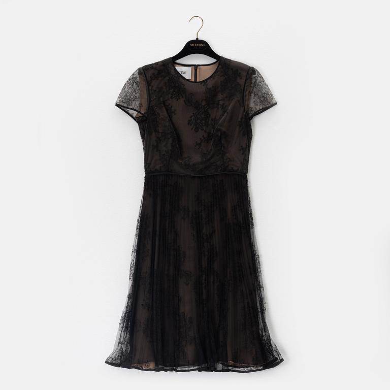 Valentino, a black lace dress, size 6.