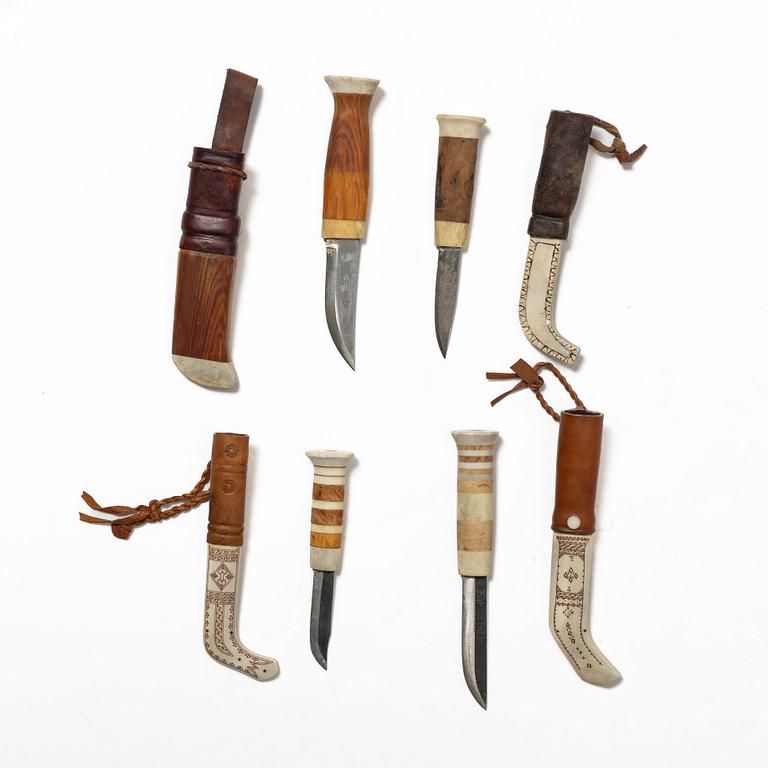 Eight knives, of which seven are half-horn knives, signed.