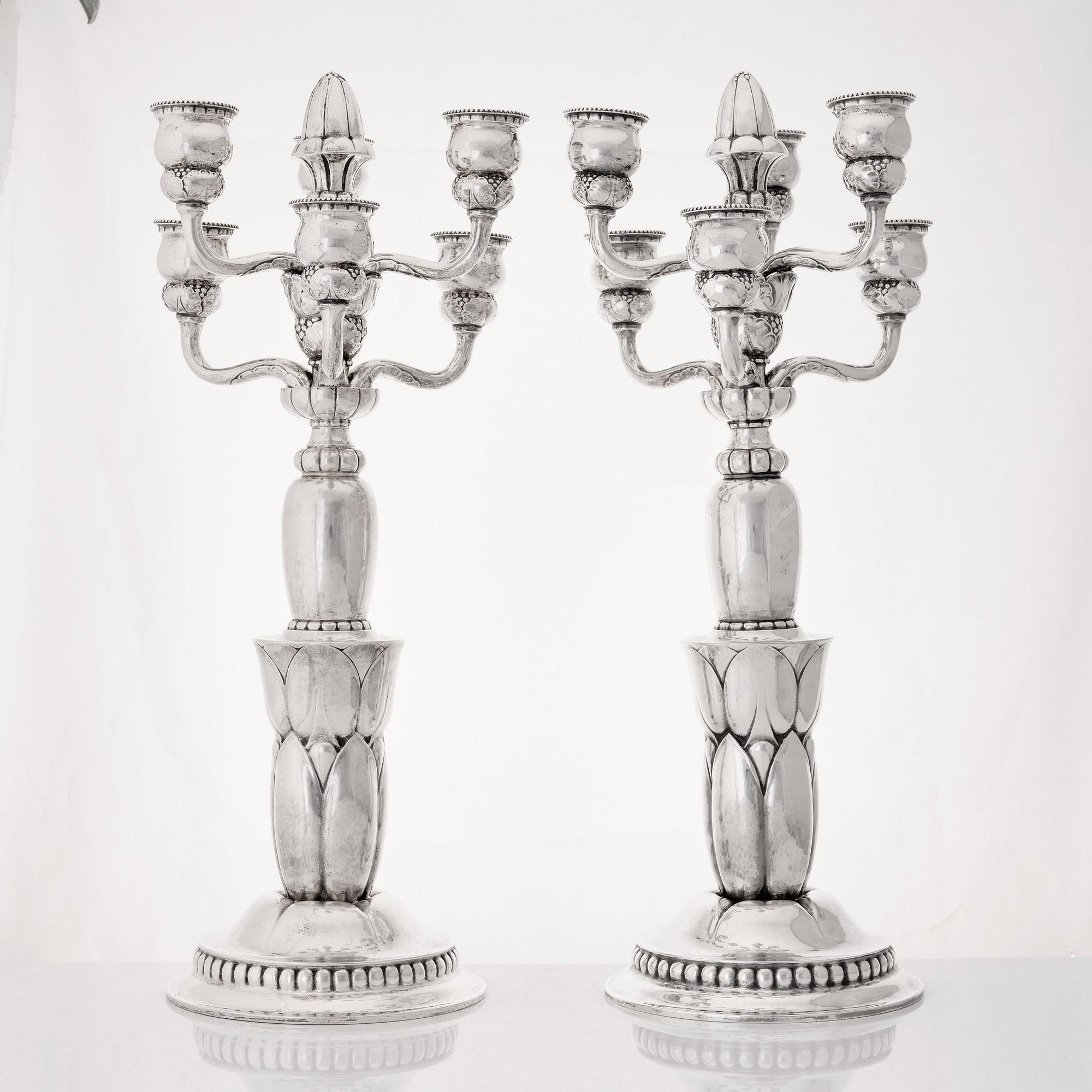 Georg Jensen, a pair of six lights silver candelabra, Copenhagen 1920, design nr 38.