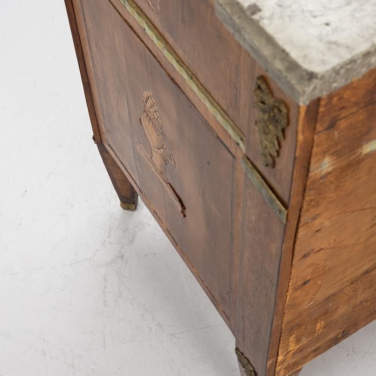 A Gustavian marquetry commode by C- Lindborg (master in Stockholm 1781-1808).