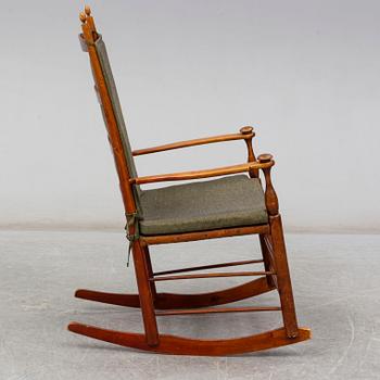 An early 20th century rocking chair.