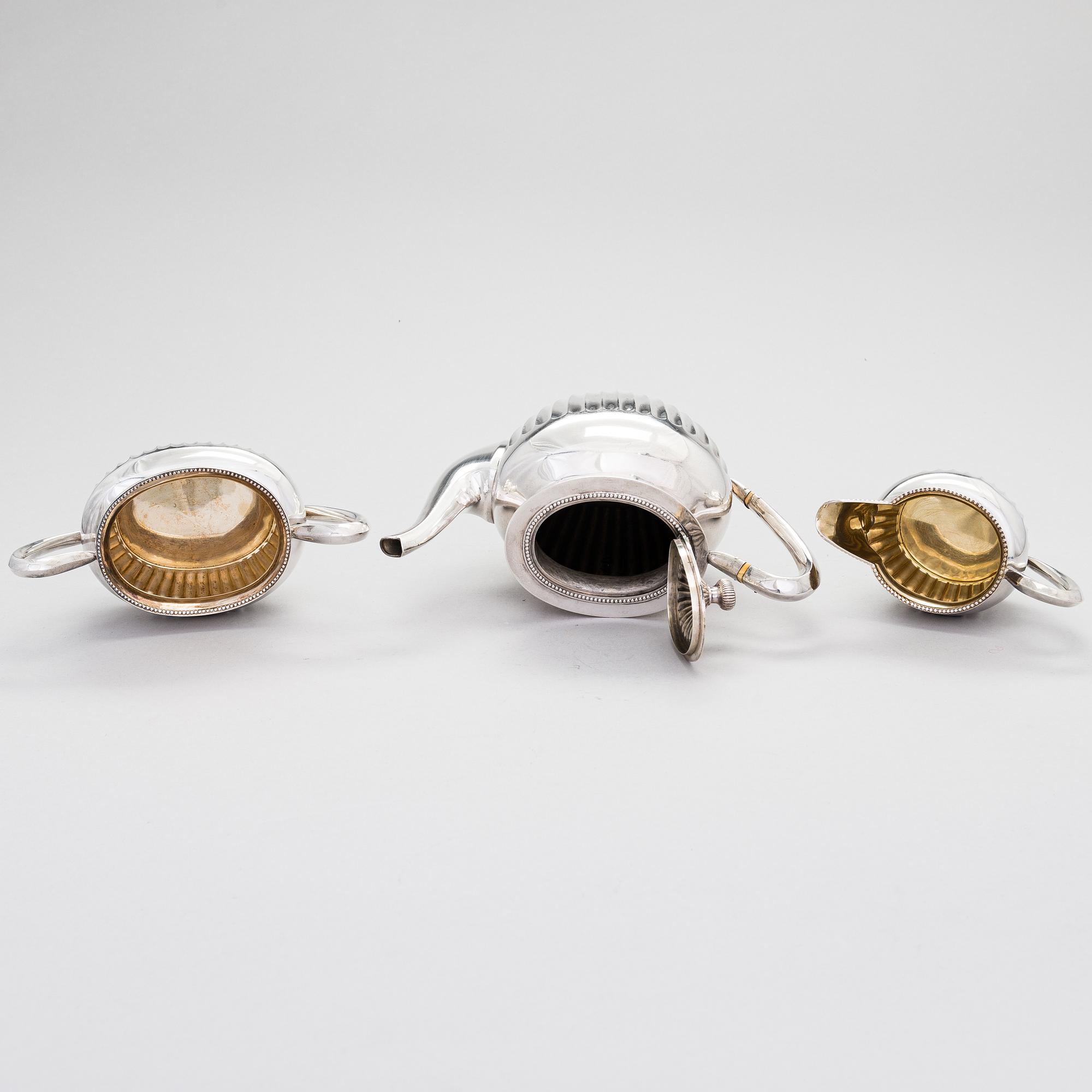 A three-piece gadrooned silver coffee set, Helsinki and Turku 1911 and 1914.