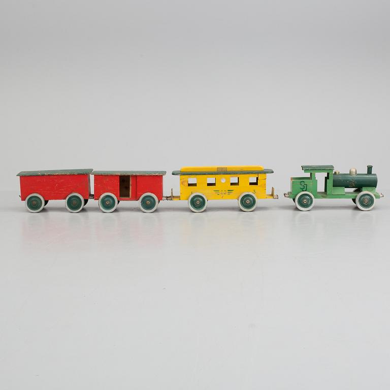 A set of four pieces wooden toy train.