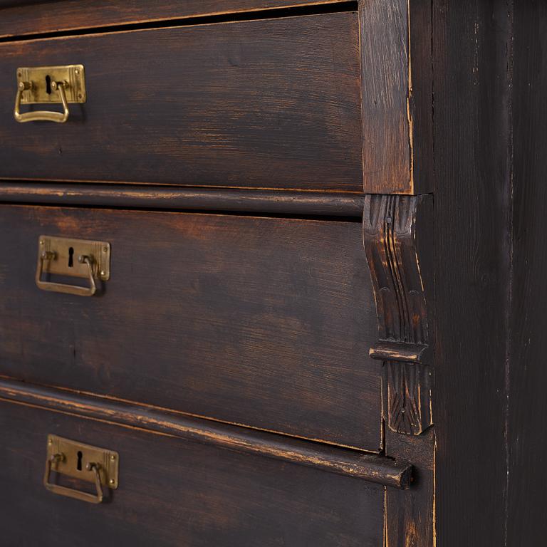 A chest of drawers, circa 1900.