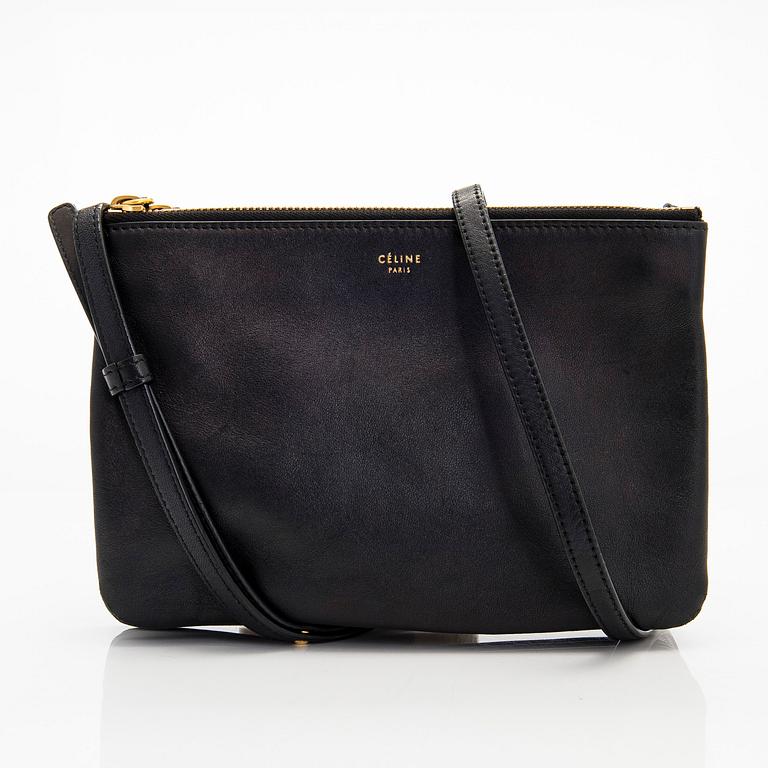 Céline, a black leather 'Trio Small' bag.