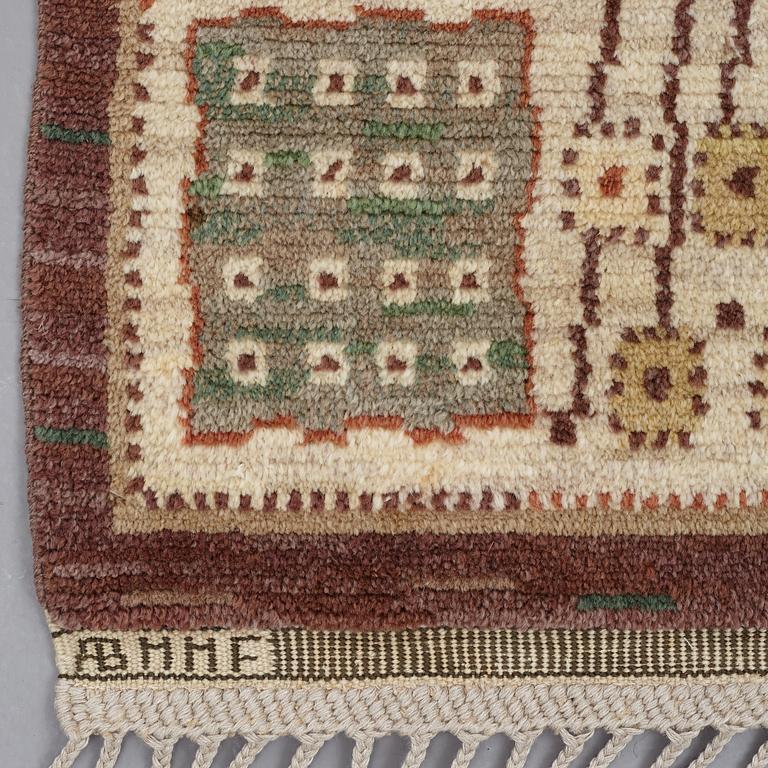 Märta Måås-Fjetterström, A CARPET, "Örtagården", knotted pile, ca 328,5 x 223,5 cm, signed AB MMF.