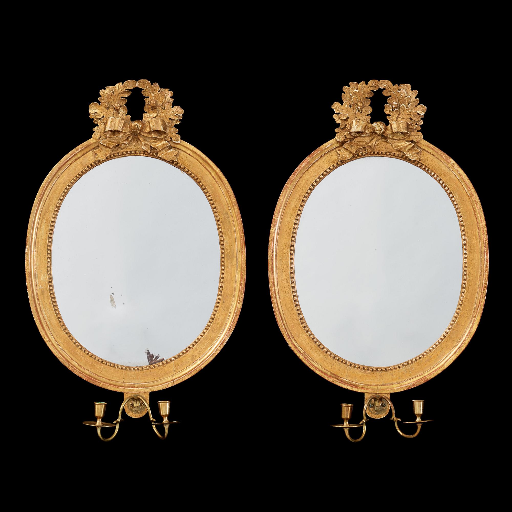 A pair of Gustavian late 18th century girandole mirrors by Johan Åkerblad, master 1758.