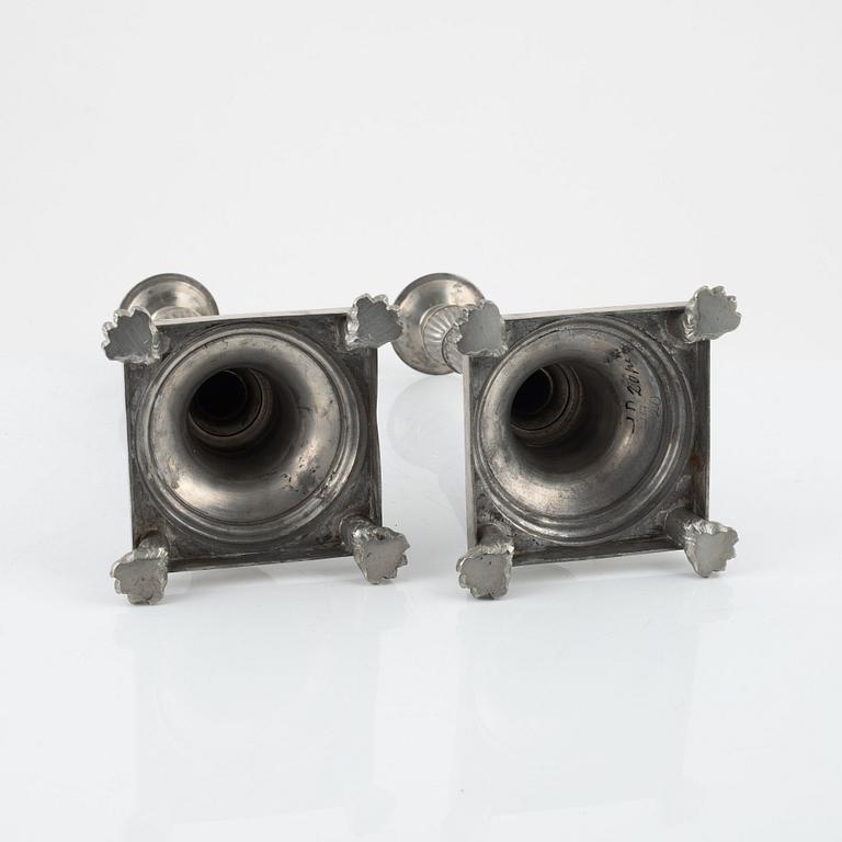 A pair of pewter candlesticks by Frans Santesson, Stockholm, 1901.