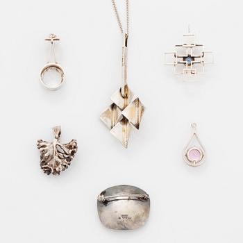Five pendants and one brooch, silver.