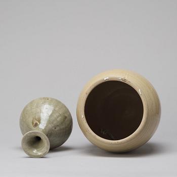 A celadon glazed jar with cover and a vase, South East Asia, 16/17th Century.