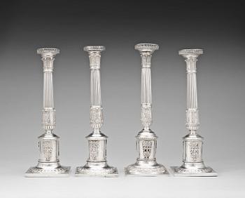 803. A matched set of four German 19th century silver candlesticks, marks of Altenburg.