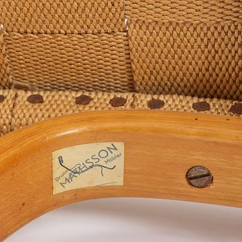 Bruno Mathsson, a lounge chair with wheels, Firma Karl Mathsson, Värnamo, 1940s, with reading table from 1972.