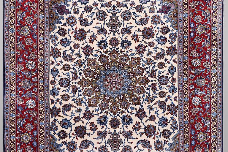 A rug, Esfahan, silk warp and part silk pile, ca 245 x 155 cm.