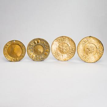 Four mid-17th century Northern and Central European reflectors plates.