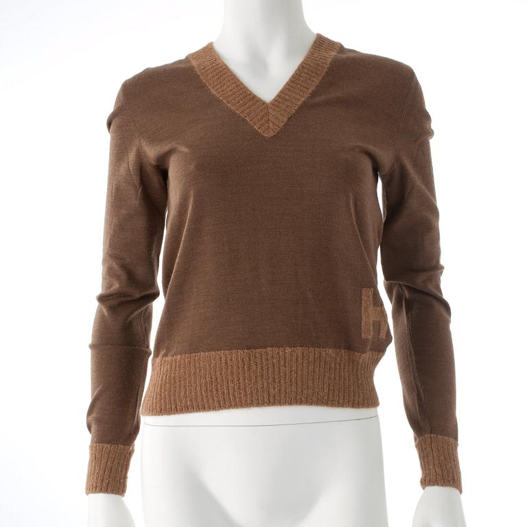 HERMÈS, a brown and beige wool and alpaca sweater.