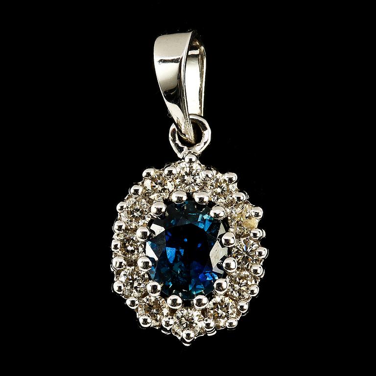 HÄNGE, 18k vitguld, fasettslipad blå safir samt små briljantslipade diamanter. Vikt 2 g.