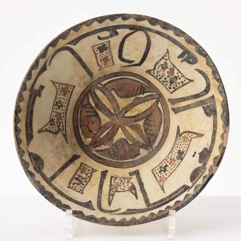 A glazed earthenware bowl, Central Asia.