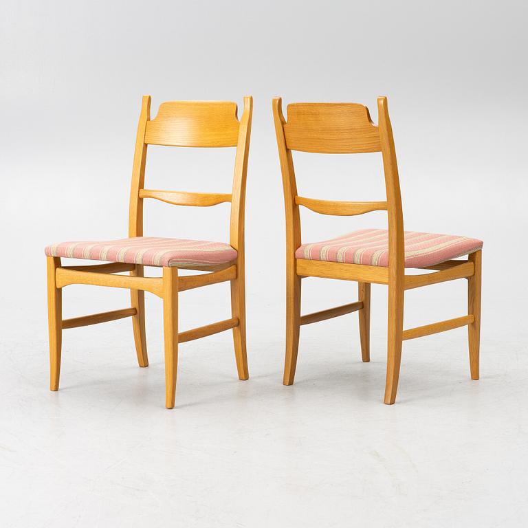 Carl Malmsten, a dining table with eight chairs, 'Camlare Nyckel', Sweden, second half of the 20th century.