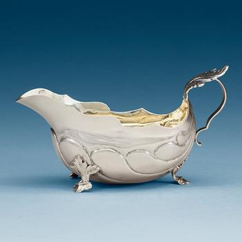 990. A Swedish 18th century parcel-gilt cream-jug, makers mark of Christian Rothe, Karlskrona 1777.