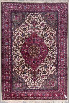 An eastern european carpet, around 294 x 205 cm.
