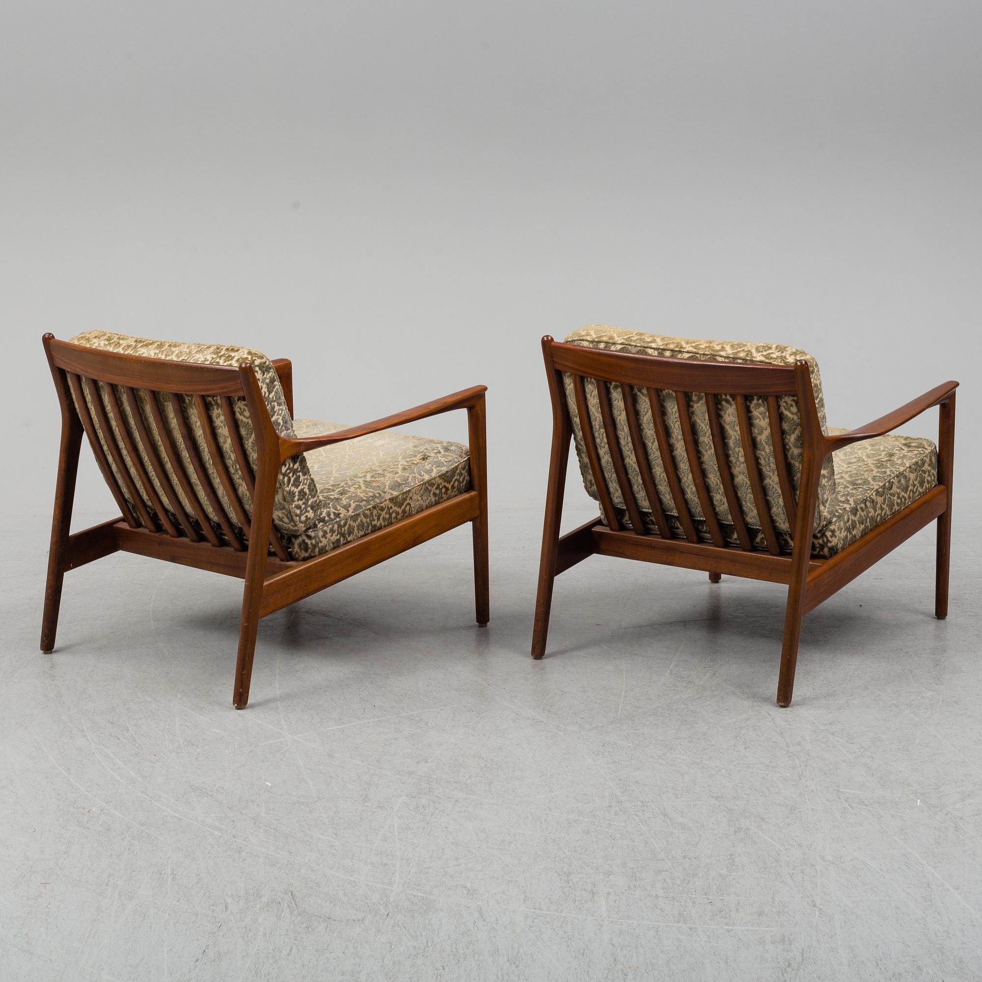 A pair of 'USA 75' teak easy chairs by Folke Ohlsson for Dux.