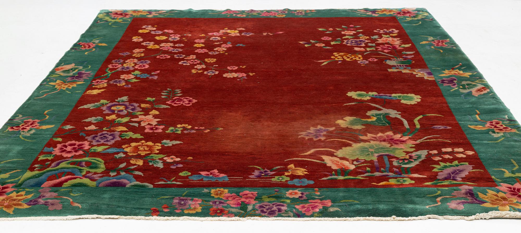 A semi-antique chinese carpet, ca 338 x 266 cm.
