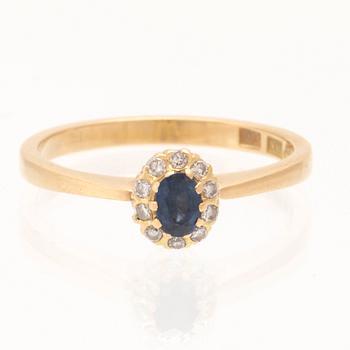 Ring, earrings, and pendant, 18K gold with sapphires and diamonds.