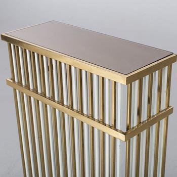 A CONSOLE TABLE/RADIATOR COVER.