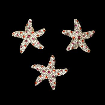 697. A brooch and a pair of earrings by Swarowskis.