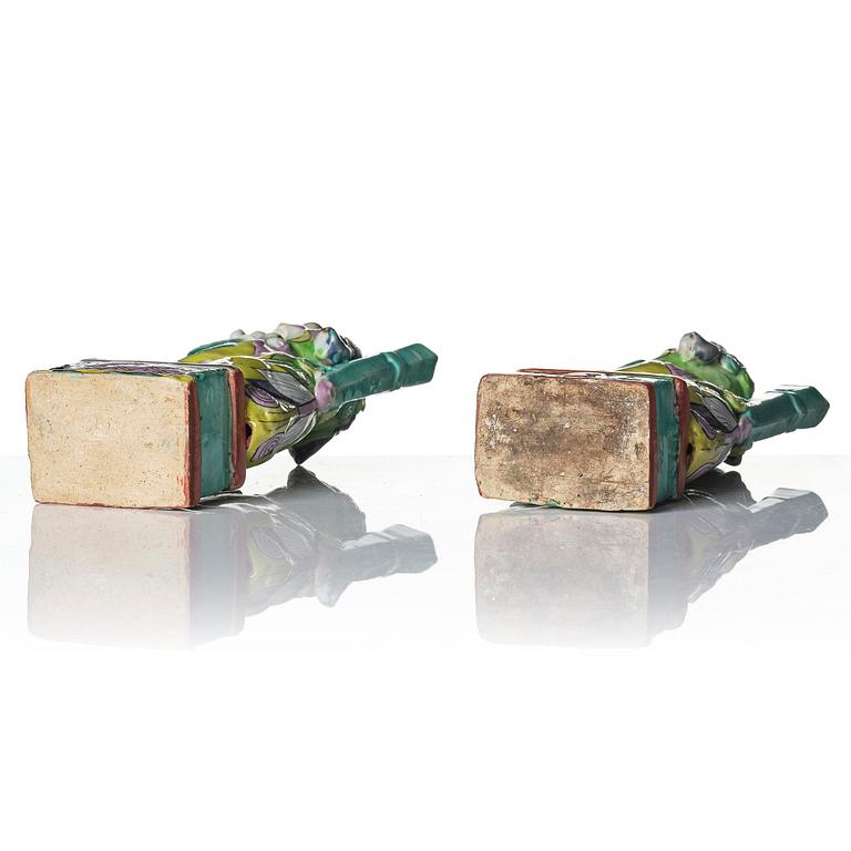A pair of famille rose 'buddhist lion' joss stick holders, Qing dynasty, circa 1800.