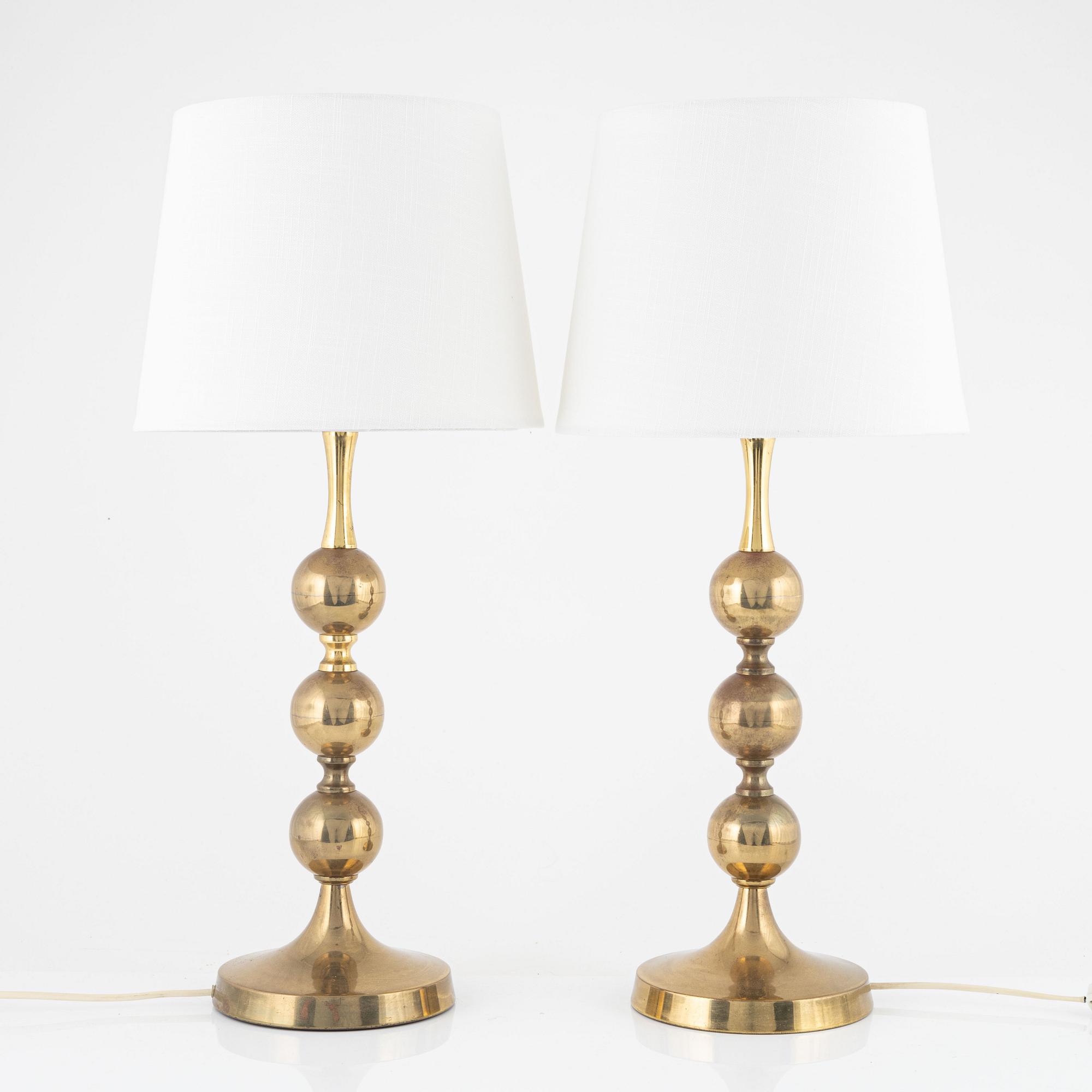 A pair of table lamps, yellow metal, second half of the 20th century.