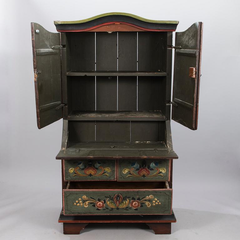 A painted 19th Century folk art bed cabinet.