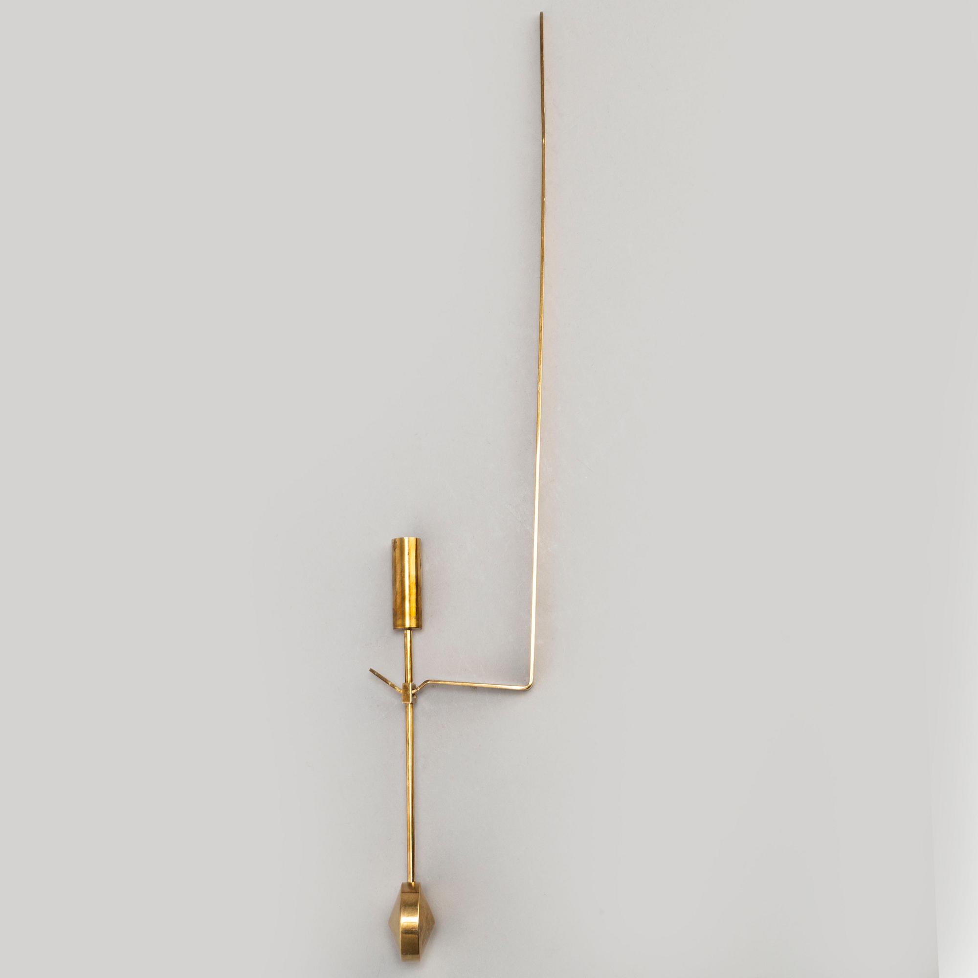 A pair of 'Pendel' wall scones by Pierre Forsell for Skultuna.
