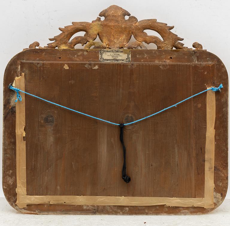 A rococo style mirror by AG Säfström Kristianstad from around the year 1900.