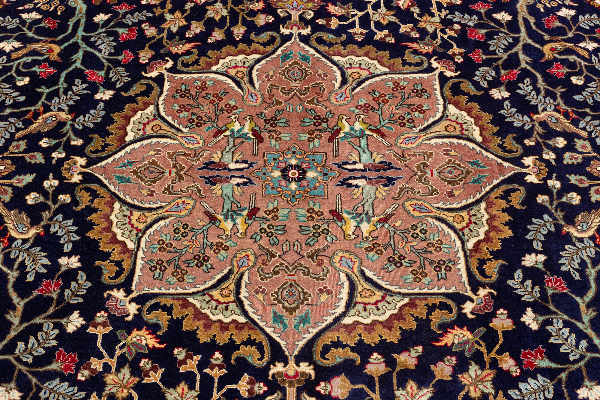 A carpet, Tabriz, signed Ipchilar, ca 385 x 280 cm.