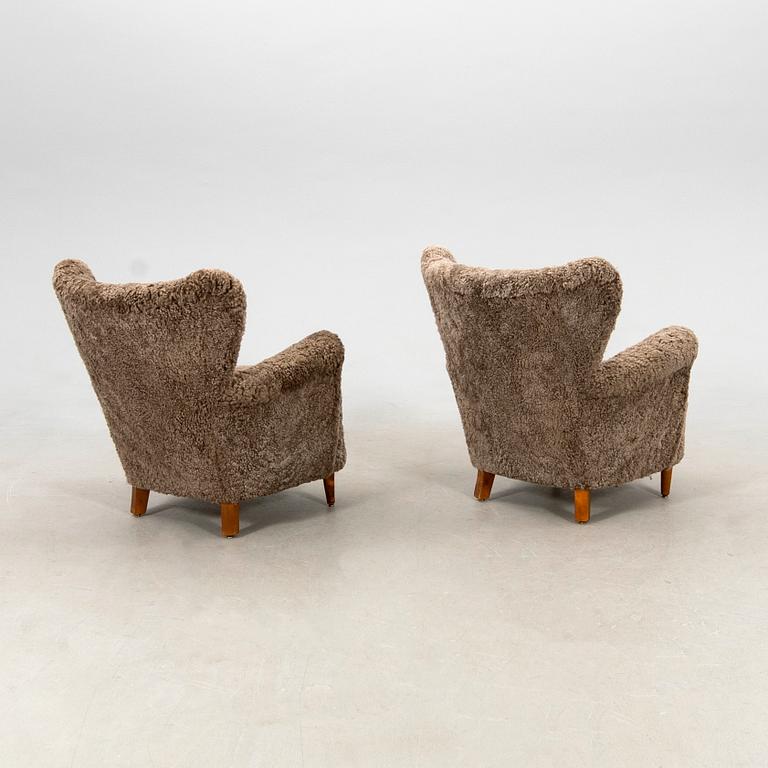 Armchairs, a pair from the 1940s.