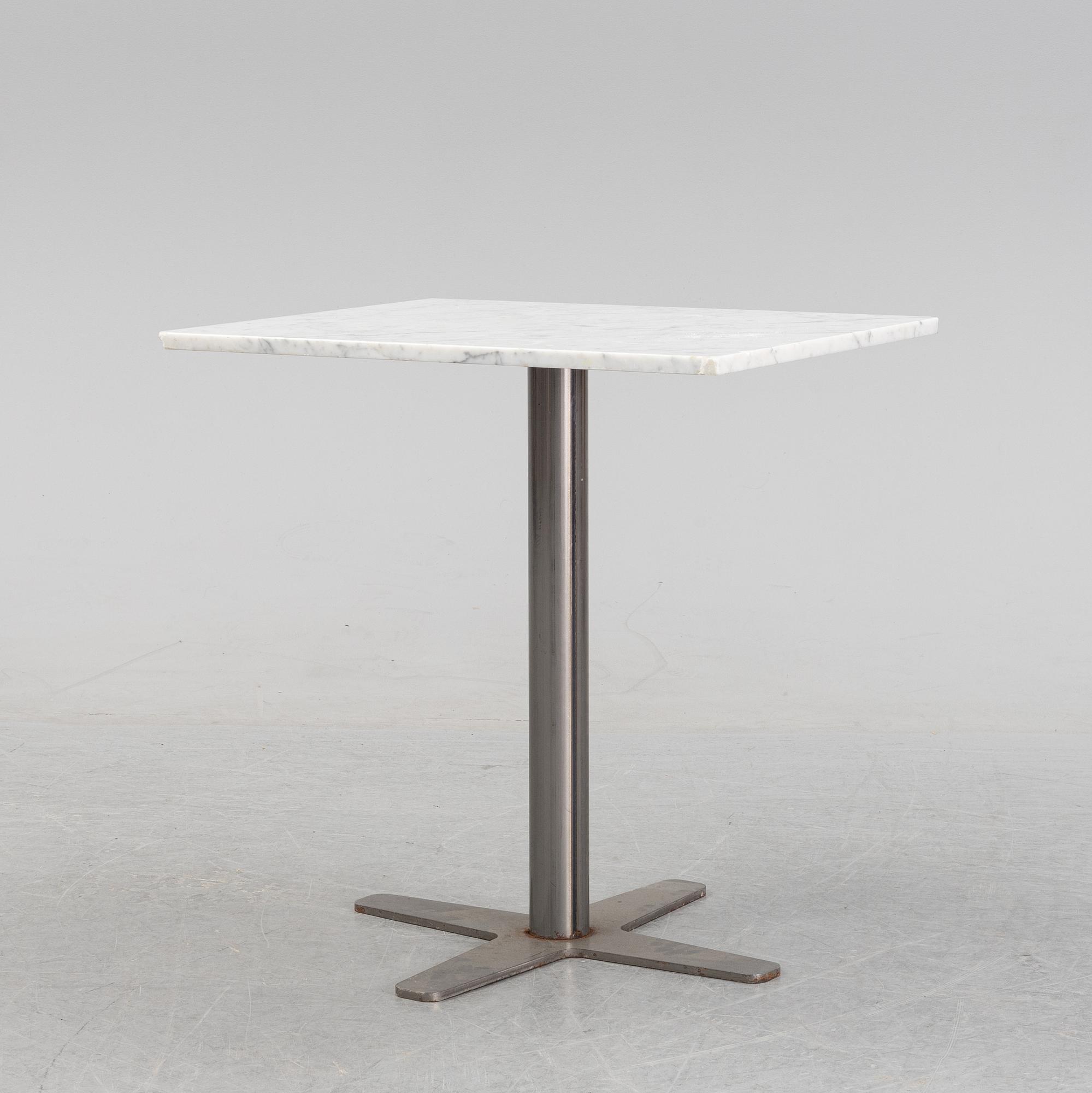 A marble top table, 21th century.