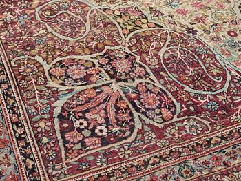 An antique Kerman Laver carpet, c. 586 x 385 cm.