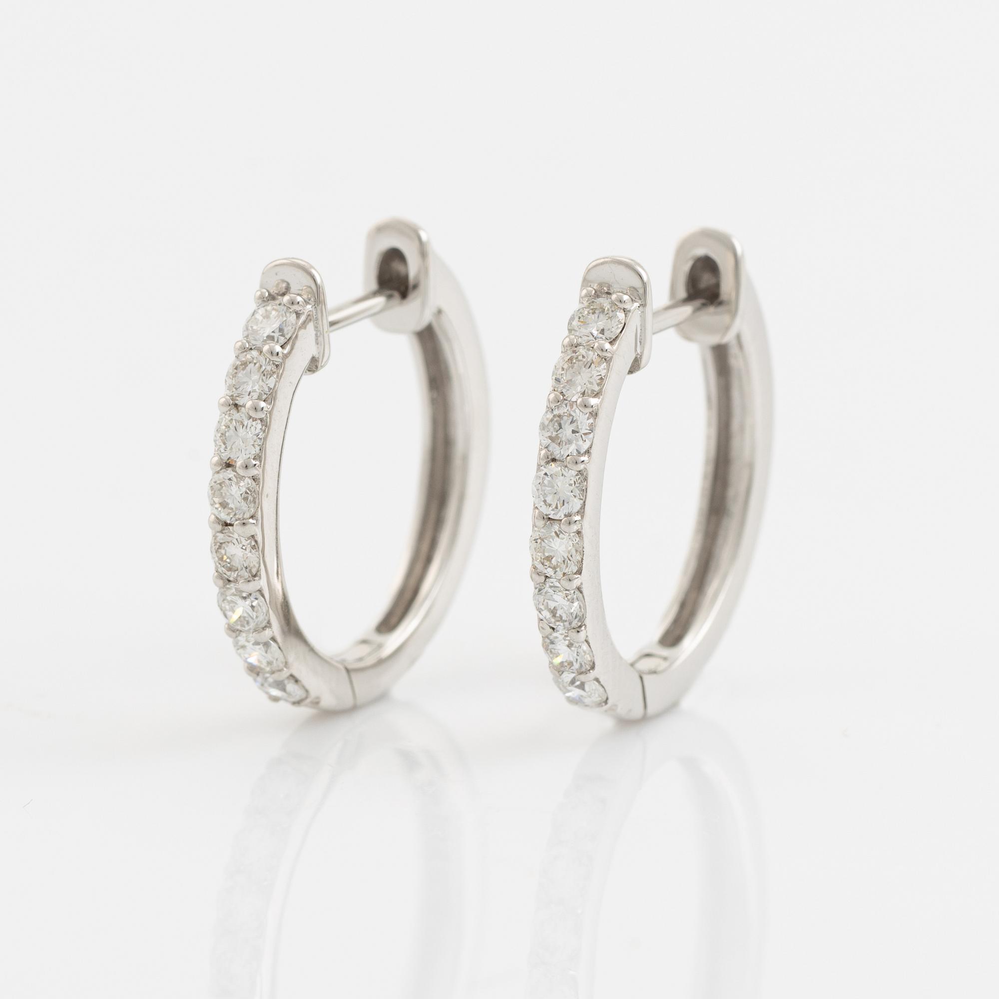 Brilliant cut diamond hoop earrings, total 0,58 ct.