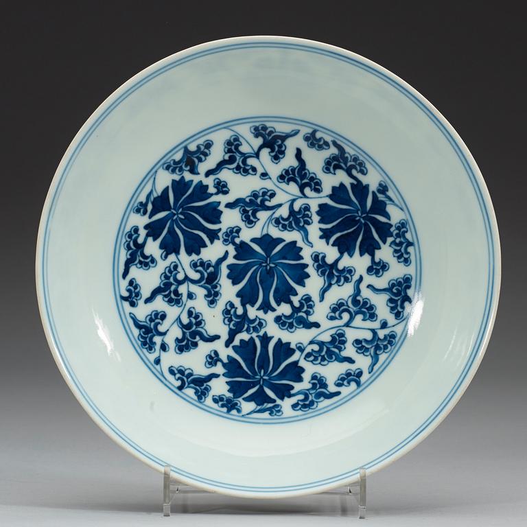 A set of four blue and white lotus dishes, Qing dyanasty with Qianlong sealmark.