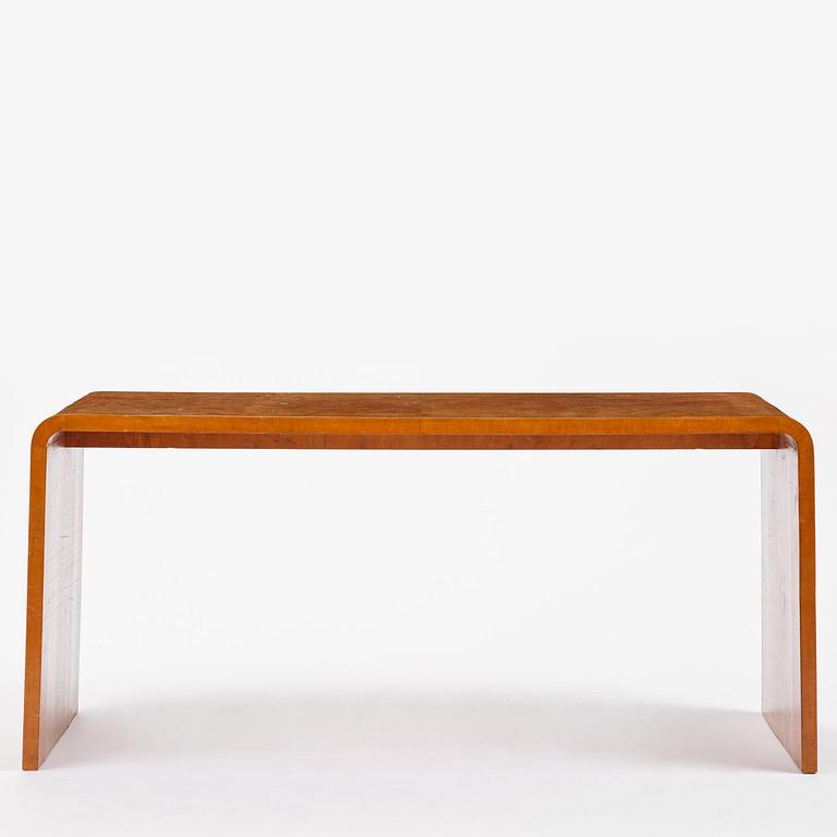 Swedish Modern, a birch veneered coffee table, 1930s-40s.