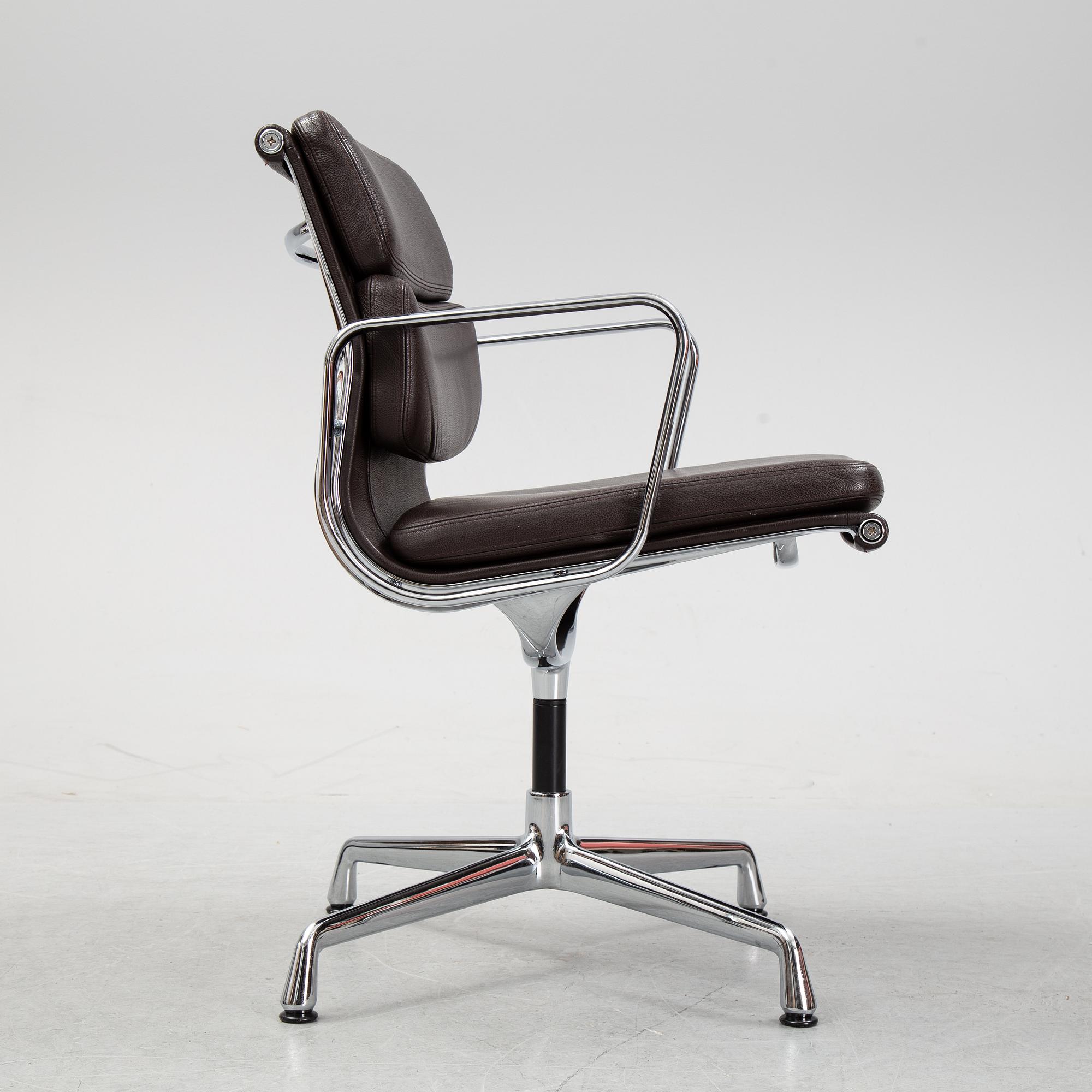 An EA 208 Soft Pad swivel chair by Charles and Ray Eames for Vitra, dated 2010.