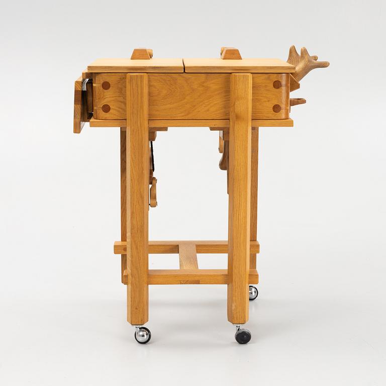 Magnus Ek, a oak wood praline trolley, Oaxen Krog, 2019.