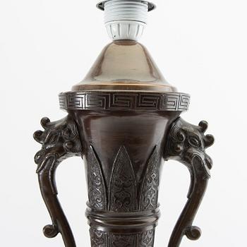 Table lamps a pair China 20th century patinated metal.