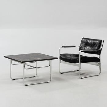 An arm chair and a coffee table by Karl Erik Ekselius for JOC in Vetlanda, second half of the 20th century.